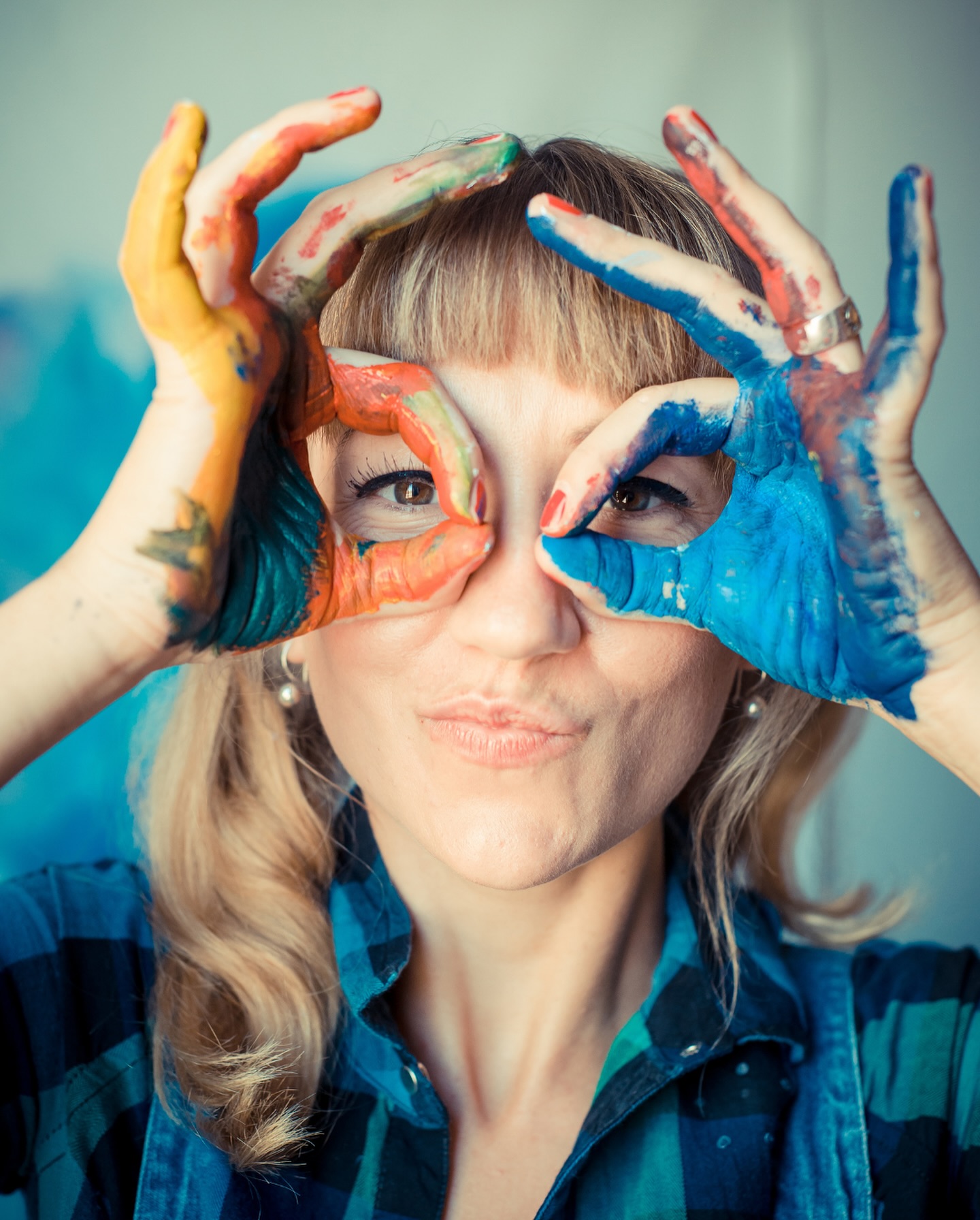 Person with paint on their hands